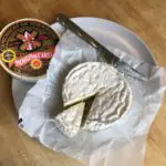 How do the French eat Camembert cheese ?